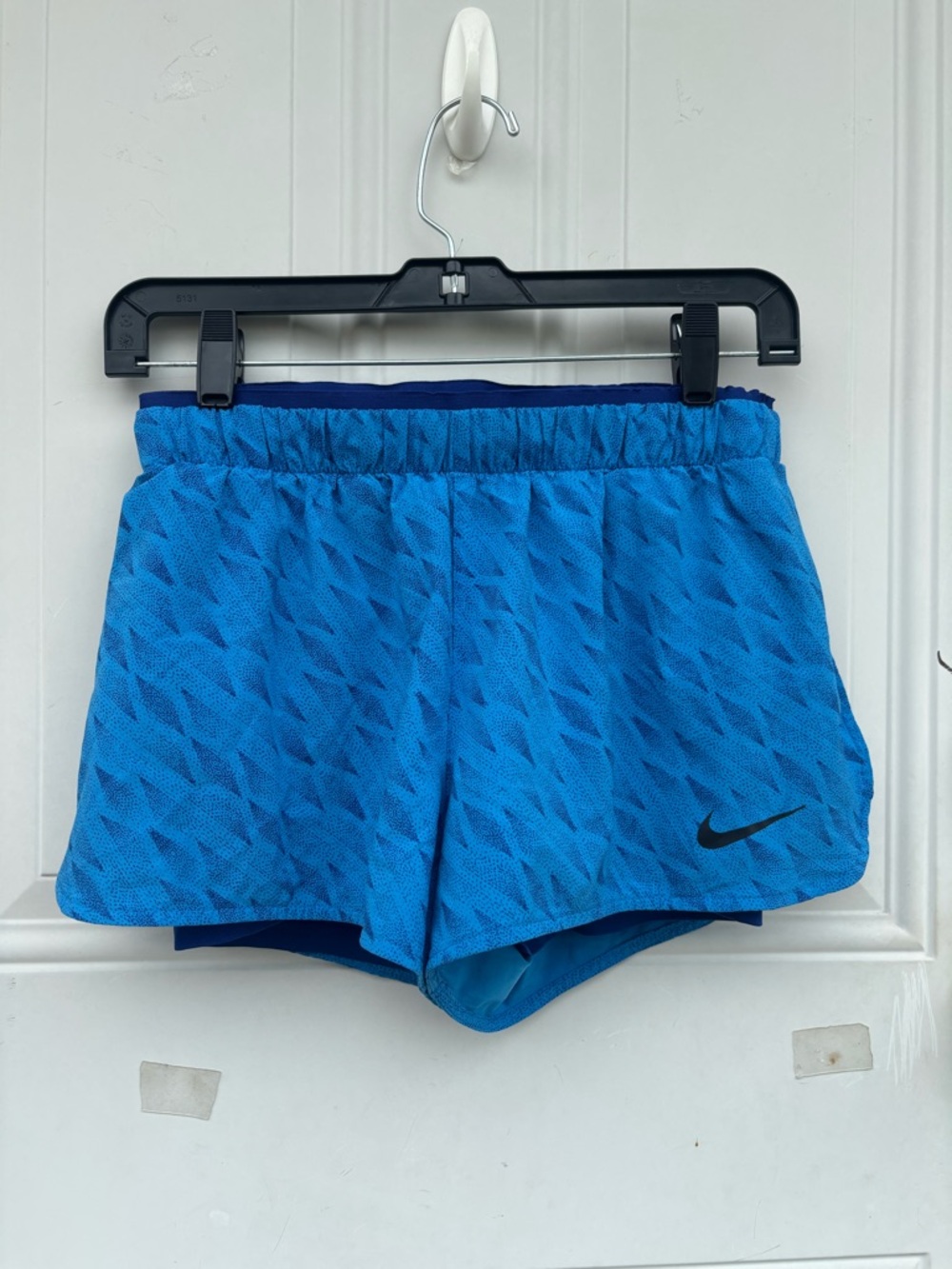 Nike Blue Textured Athletic Shorts with Black Swoosh